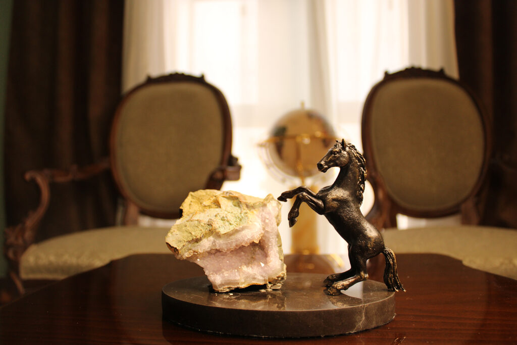 stands a bronze horse